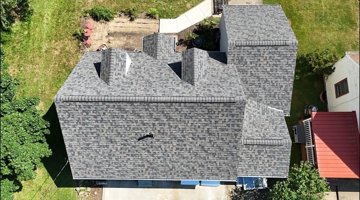 Roofing company in Denville NJ installing residential roof shingles