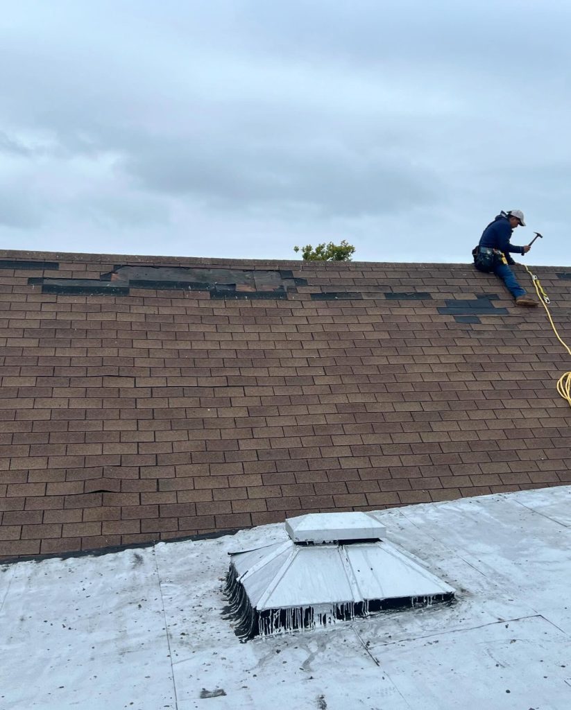 Professional roofing company in Morristown NJ installing asphalt shingles